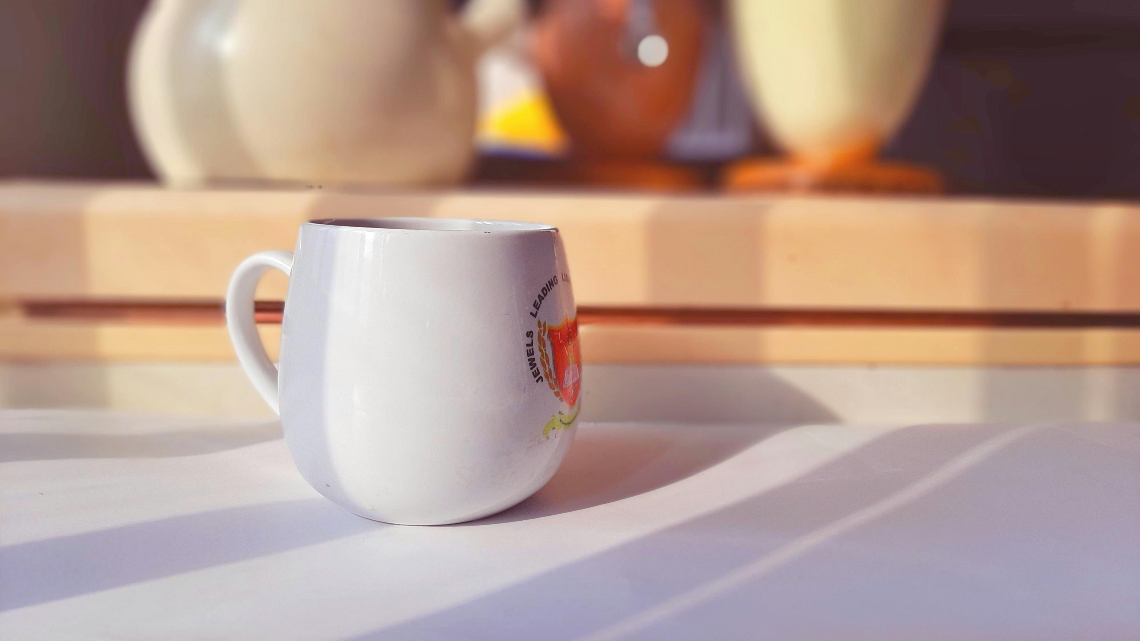 tea-cup-blurred-background.jpeg